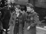 Jewish brothers from Subcarpathian Rus await selection on the ramp at Auschwitz-Birkenau.