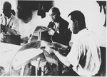 Prisoners labor in a tailoring workshop in the Stara Gradiska concentration camp.