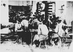 Prisoners labor in a shoe-making workshop in the Jasenovac III concentration camp.