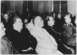 Croatian political and religious leaders sit in the audience at an unidentified ceremonial gathering.