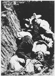Close-up of Ustasa victims lying in a mass grave.
