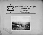 Title page of a presentation photo album of the Wasseralfingen DP camp, illustrated with a photo of an exterior view of the homes in the camp.