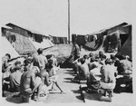 Prisoners gather outside their barracks in the Gurs concentration camp in France.