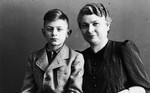 Studio portrait of a young boy, Norbert  Bikales, and his mother Bertha.