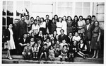 Group portrait of children and adults at the Hebrew school in the Gabersee displaced persons camp.