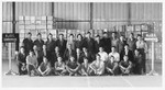 Group portrait of JDC employees at a warehouse in Munich.