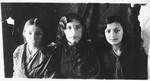 Studio portrait of three Jewish teenage girls in Chechersk, Belarus.