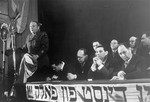Honored guests seated on the dais listen to a speech at the Third Conference of Liberated Jews in the US Zone of Germany.