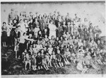 Group portrait of women and children in the Pecana camp in Sisak (near the village of Goldovo).