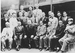 Group portrait of Yugoslav men.

Among those pictured is Mehmed Hujika (standing in the top row, right side), a teacher from Zenica and Muslim resistance fighter.