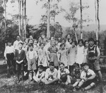 Seventeen Jewish refugee children join other children on a picnic shortly after their arrival in Melbourne.