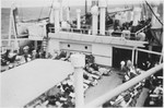 View of Jewish refugee passengers lounging on the deck of the MS St.