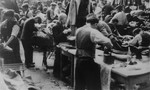 Jewish men work in a clothing workshop in the Lodz ghetto.