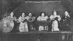 Group portrait of the Ovici family, a family of Jewish dwarf entertainers who survived Auschwitz, in a performance of the Liliputan Jazz Concert.