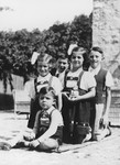 A group of children pose outside in Moroeni, Romania.