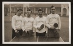 Group portrait of members of the Tikvah ping pong team.