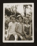 Close-up portrait of Deborah Wacs and two friends in Shanghai.