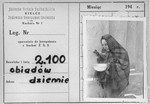 An identification card bearing a photo of a woman eating a bowl of soup in the Kielce ghetto.
