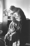Benno Aussen gives his father Asser Maurits a haircut while in hiding in wartime Amsterdam.