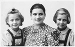 Studio portrait of a Jewish mother and her two children in Holice, Czechoslovakia.