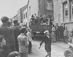 Members of the Belgian resistance (the "FIN") arrest alleged collaborators in Couvin following the liberation of the town by Allied forces.