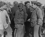 American investigator George Atlas questions a member of the Hitler Youth arrested for blowing up a U.S.