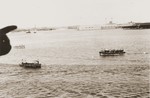 View of Havana harbor with several small boats carrying relatives of St.