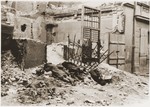 The bodies of Jewish resisters lie in front of the ruins of a building where they were shot by the SS during the suppression of the Warsaw ghetto uprising.