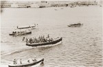 View of Havana harbor with several small boats carrying relatives of St.