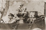 German policemen operate the radio command car during the suppression of the Warsaw ghetto uprising.