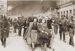 Jews captured during the suppression of the Warsaw ghetto uprising are marched to the Umschlagplatz for deportation.