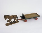 A toy wooden horse and cart used by Max Arpels Lezer, a Jewish child living in hiding in German-occupied Holland.