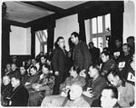 Dr. Franz Blaha, a former camp inmate, confronts Dachau commandant Martin Gottfried Weiss in the prisoner's dock.