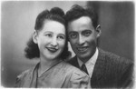 Studio portrait of a Jewish couple in postwar Warsaw.