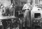 Prisoners weld metal at a Slovak labor camp.