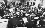 Prisoners sew clothing at a Slovak labor camp.