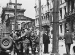 Red Army soldiers congregate on a street in Berlin after the fall of the city.