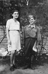 A brother and sister, who survived Auschwitz as Mengele twins, pose together in their hometown after the war.