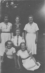 Six Jewish teenage girls pose together for a group portrait.