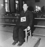 Defendant Sylvester Filleboeck sits at the dock during the Dachau war crimes trial.