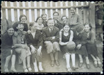Group portrait of students in a physical education class at a Polish secondary school.