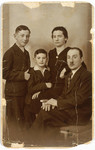 Studio portrait of a Jewish family in Lodz Poland.