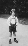 Close-up portrait of an Austrian-Jewish child wearing lederhosen.