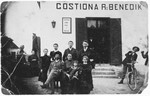 A Jewish family poses outside their inn in a small town in Croatia.