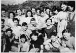 Postwar group portrait of members of the Gordonia-Maccabi Hatzair youth movement.