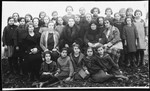 Group portrait of girls and faculty in a Polish school in Grzymalow.
