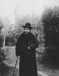 Rabbi Moshe Chaim Lau poses in the garden of his home in Presov.