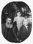 Portrait of a Jewish child in Drohobycz with his great-grandparents.