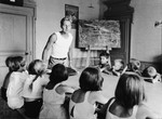 Fritz Amman teaches a class in the Pringy children's home, operated by the Swiss Red Cross.