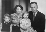 Studio portrait of a Dutch Jewish family taken either right before or right after the German invasion of the Netherlands.